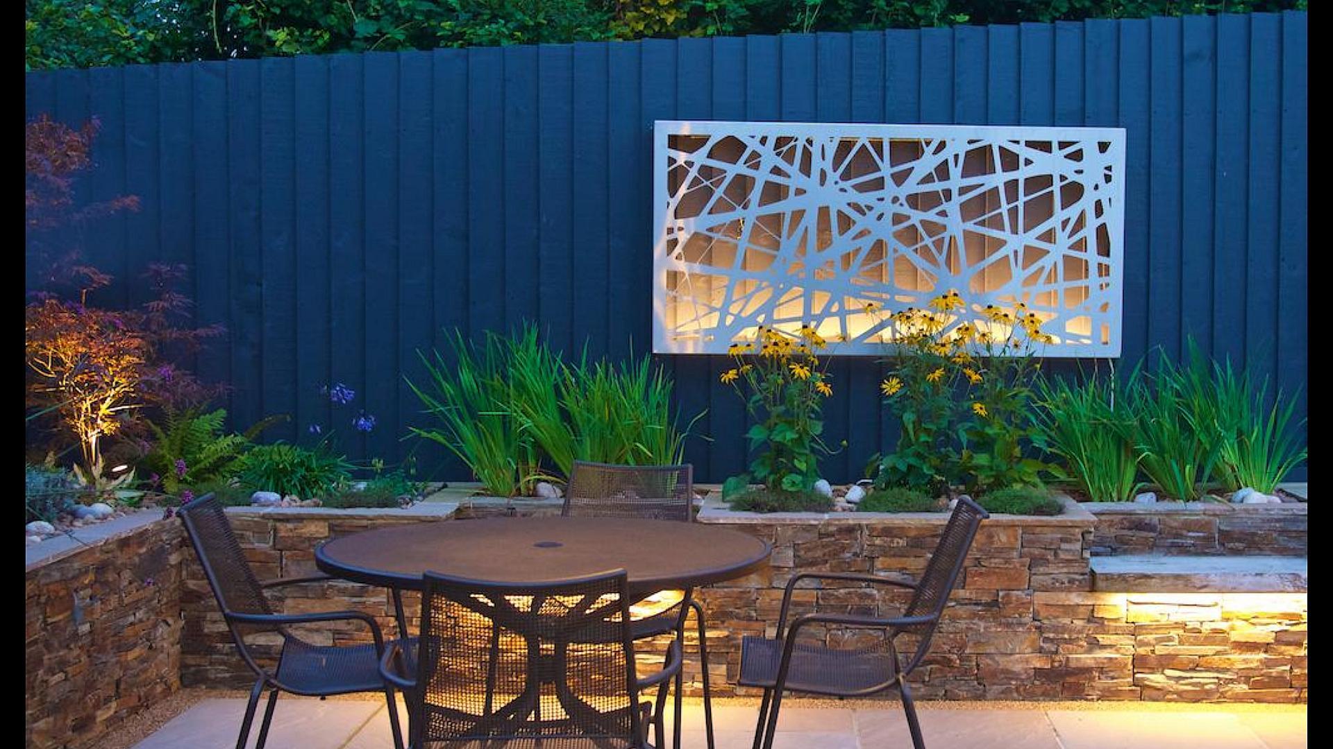 Alison Bockh Garden Design - Lighting makes for a very useable space at night.